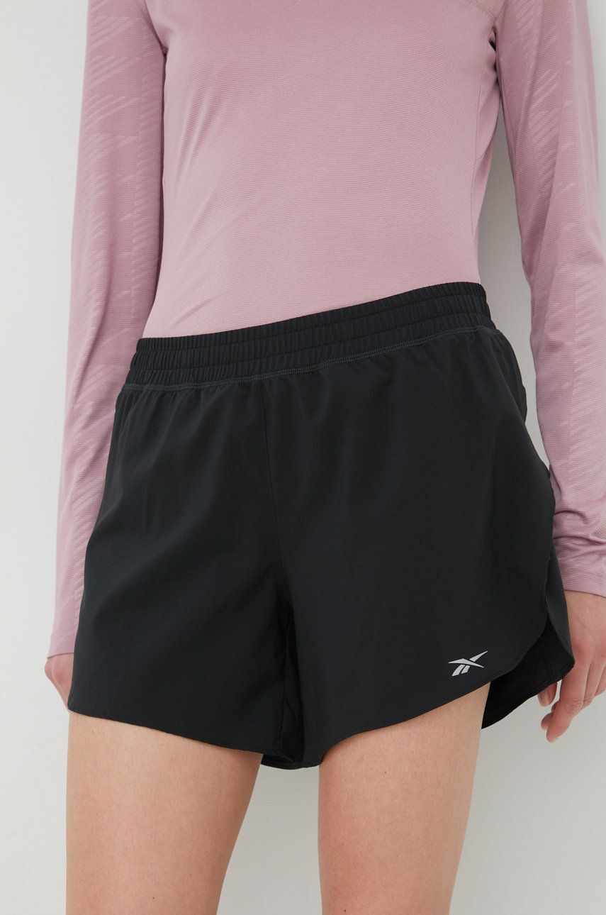 Reebok pantaloni scurți de alergare HA1043 femei, culoarea negru, neted, medium waist