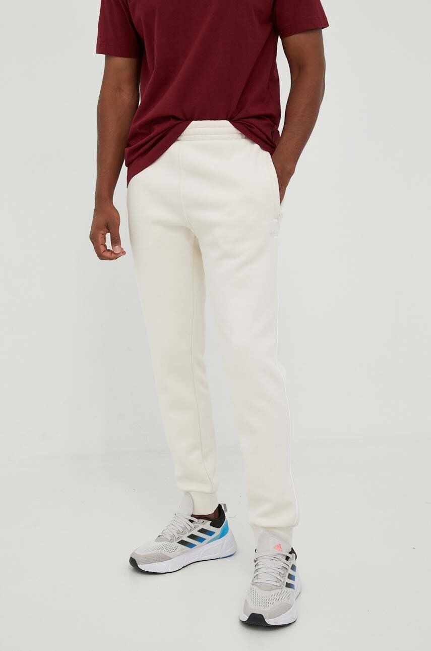 adidas Originals pantaloni de trening culoarea bej, neted